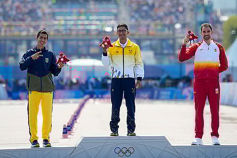 Gold medalist Brian Daniel Pintado with Caio Bonfim and Alvaro Martin